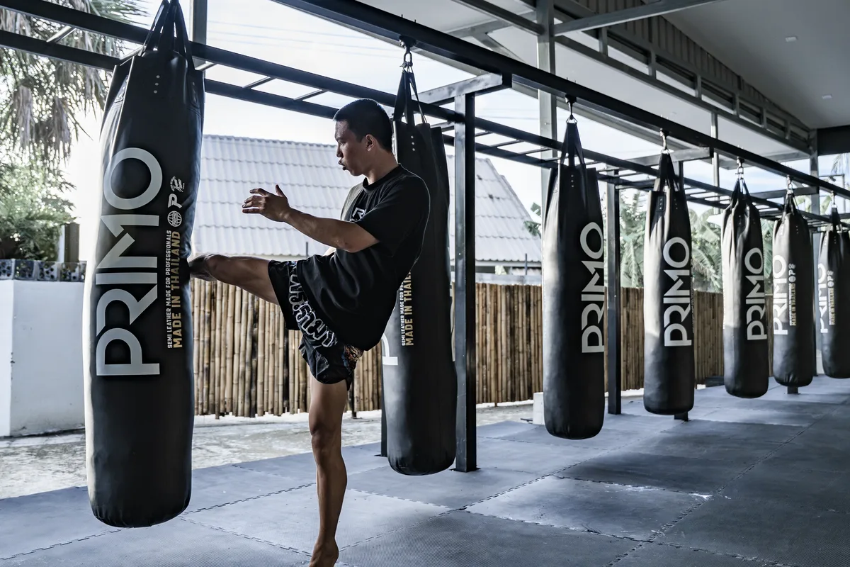 Fighter throwing a kick at R1 Phuket